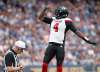 Ottawa Redblacks' quarterback Dominique Davis (4) celebrates his touchdown against the Winnipeg Blue Bombers during the first half of CFL action in Winnipeg Friday, August 17, 2018. (John Woods / The Canadian Press)