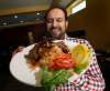 PHIL HOSSACK / WINNIPEG FREE PRESS
Barbeque Hut — Pakistani Grill owner Jehangir Khan shows off his pulao lamb chops.