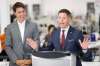 THE CANADIAN PRESS/John Woods
Prime Minister Justin Trudeau laughs as Winnipeg Mayor Brian Bowman jokes during a press conference at a new 700 employee Canada Goose manufacturing facility in Winnipeg Tuesday.