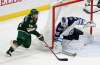 (AP Photo/Andy Clayton-King)
Minnesota Wild defenseman Jared Spurgeon sets up a goal against Winnipeg Jets goalie Laurent Brossoit during the third period of a preseason NHL hockey game Wednesday, in St. Paul, Minn.