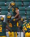 Jason Franson / The Canadian Press
Edmonton Eskimos Jordan Robinson (22) and Travis Bond (58) celebrate a touchdown against the Toronto Argonauts during first half CFL action in Edmonton, Alta., on Friday July 13, 2018.