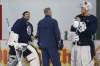 JOHN WOODS / WINNIPEG FREE PRESS
Winnipeg Jets goaltenders Connor Hellebuyck (left) and Laurent Broissoit chat with a coach at practice Monday.