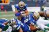 John Woods / THE CANADIAN PRESS FILES
Winnipeg Blue Bombers quarterback Chris Streveler goes up and over the line of scrimmage for a touchdown against the Saskatchewan Roughriders in the Banjo Bowl in September.