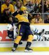 AP Photo/Mark Humphrey
Nashville Predators center Zac Rinaldo checks Winnipeg Jets defenseman Joe Morrow as the two teams renewed hostilities Thursday in Nashville.