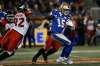 THE CANADIAN PRESS/John Woods
Winnipeg Blue Bombers quarterback Matt Nichols attempts to get out of the grasp of Calgary Stampeders' Ese Mrabure during the first half of CFL action in Winnipeg, Friday.