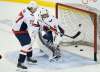 John Woods / THE CANADIAN PRESS
Washington Capitals' T.J. Oshie scores on goaltender Gavin McHale during the warm up prior to the Caps game against the Winnipeg Jets in Winnipeg on Wednesday. McHale is a womens' goalie coach at the University of Manitoba and was filling in for Capitals goaltender Braden Holtby who was not able to play.