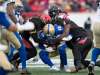 THE CANADIAN PRESS/Todd Korol
Winnipeg Blue Bombers quarterback Matt Nichols is sacked by Calgary Stampeders defenders during the first half of the West Final in Calgary, Sunday. The Bombers offence failed to score a major against a stingy Stampeders defence in the 22-14 loss.