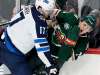 Adam Lowry &mdash; who caused some discomfort to Minnesota's Joel Eriksson Ek on this hit in November &mdash; expects a close, tough game tonight when the two teams meet for the third time this season. (Hannah Foslien / The Associated Press files)