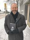 SUPPLIED
Dr. Neil Craton with his book Wisdom from the Homeless.