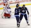 THE CANADIAN PRESS/Trevor Hagan
Winnipeg Jets centre Mark Scheifele celebrates with right wing Blake Wheeler after scoring on New York Rangers goaltender Henrik Lundqvist during the first period in Winnipeg, Tuesday.