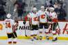 THE CANADIAN PRESS/John Woods
Calgary Flames players celebrate a goal against the Winnipeg Jets during the third period of their 4-1 victory over the Jets in Winnipeg last December. The Flames have owned the Jets so far this season and Winnipeg hopes to prevent a season sweep of the series when the Flames come to town Saturday.