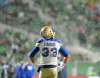 Winnipeg Blue Bombers running back Andrew Harris watches the reply of his touchdown against the Saskatchewan Roughriders during second half CFL West Division semifinal action in Regina on Sunday, Nov. 11, 2018. THE CANADIAN PRESS/Mark Taylor