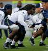 (AP Photo/Ted S. Warren)
Defensive tackle Brandin Bryant, centre, during a scrimmage with the Seattle Seahawks in 2016. The Bombers second-year D-lineman focussed on dropping some weight this off-season.