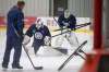 MIKE DEAL / WINNIPEG FREE PRESS
Winnipeg Jets goaltending prospect Arvid Holm (right) watches Logan Neaton work on a drill during development camp on Monday morning.