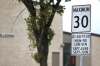 School zone traffic signs on Lakewood Boulevard near Ecole Van Belleghem School. (Ruth Bonneville / Winnipeg Free Press files)