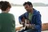 This image released by Universal Pictures shows Lily James,, left, and Himesh Patel in a scene from 