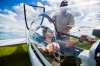 MIKAELA MACKENZIE / WINNIPEG FREE PRESS
Jen Zoratti lifts the top after trying gliding for the first time with Winnipeg Gliding Club president Mike Maskell at the Starbuck Airfield south west of Winnipeg.