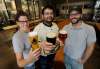 TREVOR HAGAN / WINNIPEG FREE PRESS files
Trans Canada Brewing Co.&rsquo;s head brewer Morgan Wielgosz (from left), with president Matt Tallman and quality leader Josh Adler, has spearheaded a new line of fruit-infused sour beers for the Kenaston Boulevard brewery.