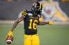 PETER POWER / THE CANADIAN PRESS FILES
Hamilton Tiger-Cats wide receiver Brandon Banks celebrates his game-winning touchdown during CFL action against the Calgary Stampeders in Hamilton on July 13.