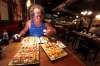 PHIL HOSSACK / WINNIPEG FREE PRESS
Professional eater John Jugovich finished off 46 perogies Friday night to win the eating contest at the Spirit of Ukraine Pavilion at Folklorama. On Saturday he was craving sushi.