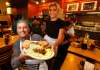 PHIL HOSSACK / WINNIPEG FREE PRESS
Ami Hassan and Chantel Nygaard show off the Falafel Place’s giant Denver omelette.