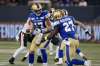 John Woods / The Canadian Press files
Blue Bombers quarterback Chris Streveler hands off to Johnny Augustine.