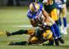 JEFF MCINTOSH / THE CANADIAN PRESS FILES
Nic Demski (top, bowling over Edmonton Eskimos defender Don Unamba) is second in total receiving yards for the Blue Bombers with 356 yards so far this season.