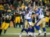 JEFF MCINTOSH / THE CANADIAN PRESS FILES
Winnipeg Blue Bombers quarterback Chris Streveler, centre, throws the ball as Edmonton Eskimos' Kwaku Boateng closes in during second half CFL football action in Edmonton, Friday, Aug. 23, 2019.