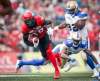 JEFF MCINTOSH / THE CANADIAN PRESS FILES
Bombers defensive lineman Drake Nevis (right, behind teammate Brandon Alexander) takes off after Stampeders ball carrier DaVaris Daniels. Nevis is quietly putting together a strong season.