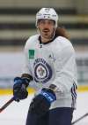 MIKE DEAL / WINNIPEG FREE PRESS
Jets forward Mathieu Perreault focuses during a skate at Bell MTS Iceplex on Monday morning.