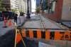 MIKE DEAL / WINNIPEG FREE PRESS
The Main Street sidewalk that runs along the McKim Building at Main and Bannatyne is getting narrower to make room for a loading zone for the building that was lost when bike lanes were installed on Bannatyne Avenue.