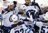 (AP Photo/Noah K. Murray)
Winnipeg Jets celebrate beating the New Jersey Devils in a shootout last Friday in Newark, N.J. The Jets return home from their season-opening 4-game road trip with a 2-2-0 record.