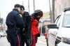 Mike Sudoma / Winnipeg Free Press
A female suspect is taken into a Winnipeg police cruiser after being involved in a standoff with the Winnipeg police Thursday.