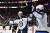 David Becker / The Associated Press
Jets right-winger Blake Wheeler (left) and centre Mark Scheifele celebrate Scheifele's third-period goal Saturday night in Las Vegas.