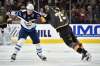 DAVID BECKER / THE ASSOCIATED PRESS
Jets centre Adam Lowry scraps with Vegas Golden Knights tough-guy Ryan Reaves.