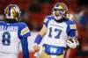 JEFF MCINTOSH / THE CANADIAN PRESS 
Winnipeg Blue Bombers quarterback Chris Streveler, right, celebrates his touchdown with teammate Zach Collaros during CFL West Semifinal football action against the Calgary Stampeders, in Calgary, Sunday, Nov. 10, 2019.