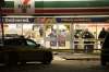 Mike Sudoma / Winnipeg Free Press
Police officers inside of the 7-Eleven on the corner of Arlington St. and Ellice Ave. after it became the scene of an officer-involved shooting Thursday evening.