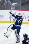 John Woods
/ The Canadian Press
Winnipeg Jets goaltender Connor Hellebuyck (37) celebrates the win over the Columbus Blue Jackets in NHL action in Winnipeg on Saturday, November 23, 2019.