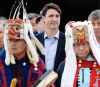 THE CANADIAN PRESS/Jonathan Hayward
Prime Minister Justin Trudeau is led out to an event by Indigenous drummers in Prince Rupert, B.C. in 2018.