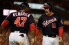 Washington Nationals' Ryan Zimmerman reacts with Howie Kendrick after scoring during the first inning of Game 4 of the baseball National League Championship Series against the St. Louis Cardinals Tuesday, Oct. 15, 2019, in Washington. (AP Photo/Jeff Roberson)