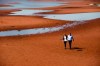 Federal Conservative leader Andrew Scheer and his wife Jill walk on the beach after making a campaign stop in Canoe Cove, P.E.I. on Sunday, September 22, 2019. THE CANADIAN PRESS/Nathan Denette