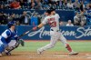 Boston Red Sox second baseman Michael Chavis (23) watches his homer to centre during thirteen inning AL baseball action against the Toronto Blue Jays in Toronto on Wednesday May 22, 2019. THE CANADIAN PRESS/Nathan Denette