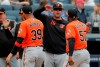 FILE - In this Saturday, March 30, 2019 file photo,Baltimore Orioles manager Brandon Hyde (18) congratulates players after they defeated the New York Yankees in a baseball game in New York. The win was Hyde's first as a major league manager. There might come a time when Brandon Hyde wakes up in the morning, grabs a newspaper and checks out the standings to see where the Baltimore Orioles stand. For now, the rookie manager simply can’t bear to look. The rebuilding Orioles limped into the All-Star break with a major league worst 27-62 record. (AP Photo/Julie Jacobson, File)