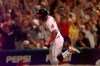 FILE - In this July 8, 1997, file photo, Cleveland Indians' Sandy Alomar rounds the bases after hitting the game winning two-run homer in the seventh inning of the 68th All-Star Game in Cleveland. Unlike in 1997 when Alomar became a hometown favorite while wearing a grinning Wahoo on his left shirt sleeve, the contentious symbol won’t be on display to the world for the 90th All-Star Game Tuesday night, July 9, 2019, in Cleveland. (AP Photo/Beth A. Keiser, File)