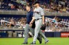 FILE - In this May 1, 2019, file photo, Cleveland Indians starting pitcher Corey Kluber, right, leaves during the fifth inning of the team's baseball game against the Miami Marlins, in Miami. For the first time since 2015, baseball’s postseason will go on without the Indians. (AP Photo/Lynne Sladky, File)
