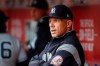 FILE - In this May 9, 2017 file photo, New York Yankees manager Joe Girardi, left, works in the dugout before the first inning of a baseball game against the Cincinnati Reds in Cincinnati. Person familiar with deal tells AP the Philadelphia Phillies are hiring Girardi as manager, Thursday, Oct. 24, 2019. (AP Photo/John Minchillo, File)