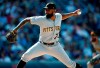 FILE - In this Sept. 1, 2019, file photo, Pittsburgh Pirates pitcher Felipe Vazquez works against the Colorado Rockies in the ninth inning of a baseball game in Denver. Pirates All-Star closer Felipe Vazquez has been arrested on charges of pornography and soliciting a child. Vazquez was taken into custody Tuesday morning, Sept. 17, 2019, by Pennsylvania State Police on one count of computer pornography/solicitation of a child and one count of providing obscene material to minors. (AP Photo/David Zalubowski, File)