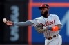 FILE - In this May 25, 2019, file photo, Detroit Tigers second baseman Josh Harrison turns a double play against the New York Mets during the eighth inning of an interleague baseball game in New York. The Detroit Tigers have released second baseman Josh Harrison after reinstating him from the injured list. The team announced the move Friday, Aug. 9, 2019. (AP Photo/Julio Cortez, File)