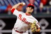 FILE - In this April 5, 2019, file photo, Philadelphia Phillies' David Robertson prepares to throw during a baseball game against the Minnesota Twins in Philadelphia. Robertson was told by Dr. James Andrews not to throw for three weeks to allow the flexor strain in his right elbow time to heal. He has not pitched since April 14. (AP Photo/Matt Slocum, File)