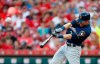FILE - In this July 2, 2019, file photo, Milwaukee Brewers' Christian Yelich hits a solo home run off Cincinnati Reds starting pitcher Tanner Roark during the fourth inning of a baseball game in Cincinnati. Josh Bell and Yelich are among eight competitors in this year’s All-Star Game Home Run Derby, which is handing out a $1 million prize to the winner. (AP Photo/Gary Landers, File)